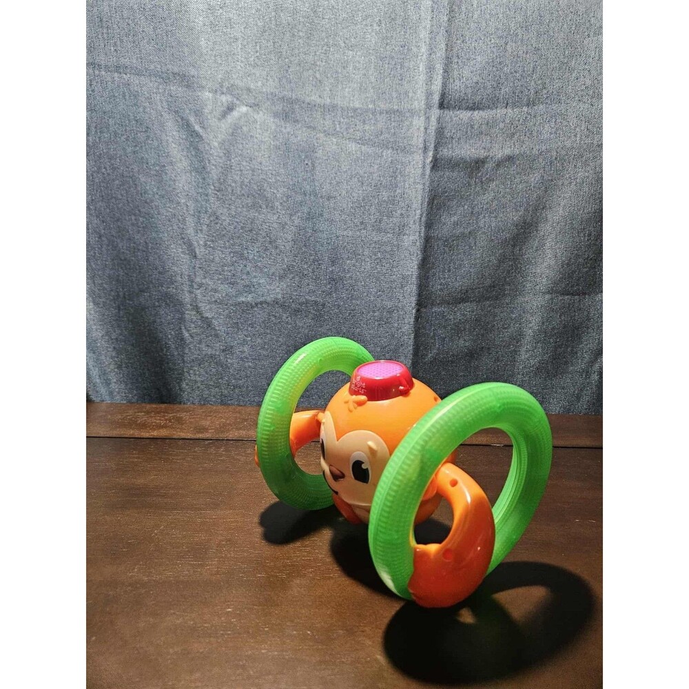 Bright Starts Roll & Glow Monkey | Musical Light Up Crawl Toy | Tummy Time Toy - Picture 10 of 16